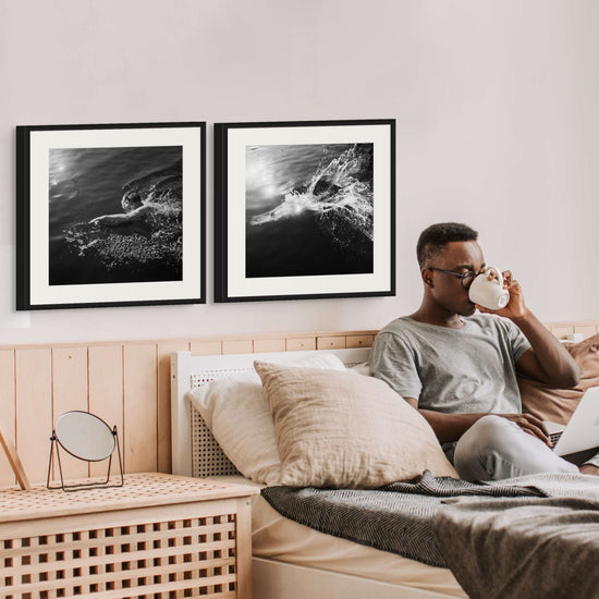 Immersed in Solitude: Vintage Pair of Black and White Solo Swimmer Photographs from Curat’d Walls. These captivating vintage photos capture the elegance and serenity of a lone swimmer navigating tranquil waters, offering a timeless, classic aesthetic for any space.