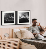 Immersed in Solitude: Vintage Pair of Black and White Solo Swimmer Photographs from Curat’d Walls. These captivating vintage photos capture the elegance and serenity of a lone swimmer navigating tranquil waters, offering a timeless, classic aesthetic for any space.